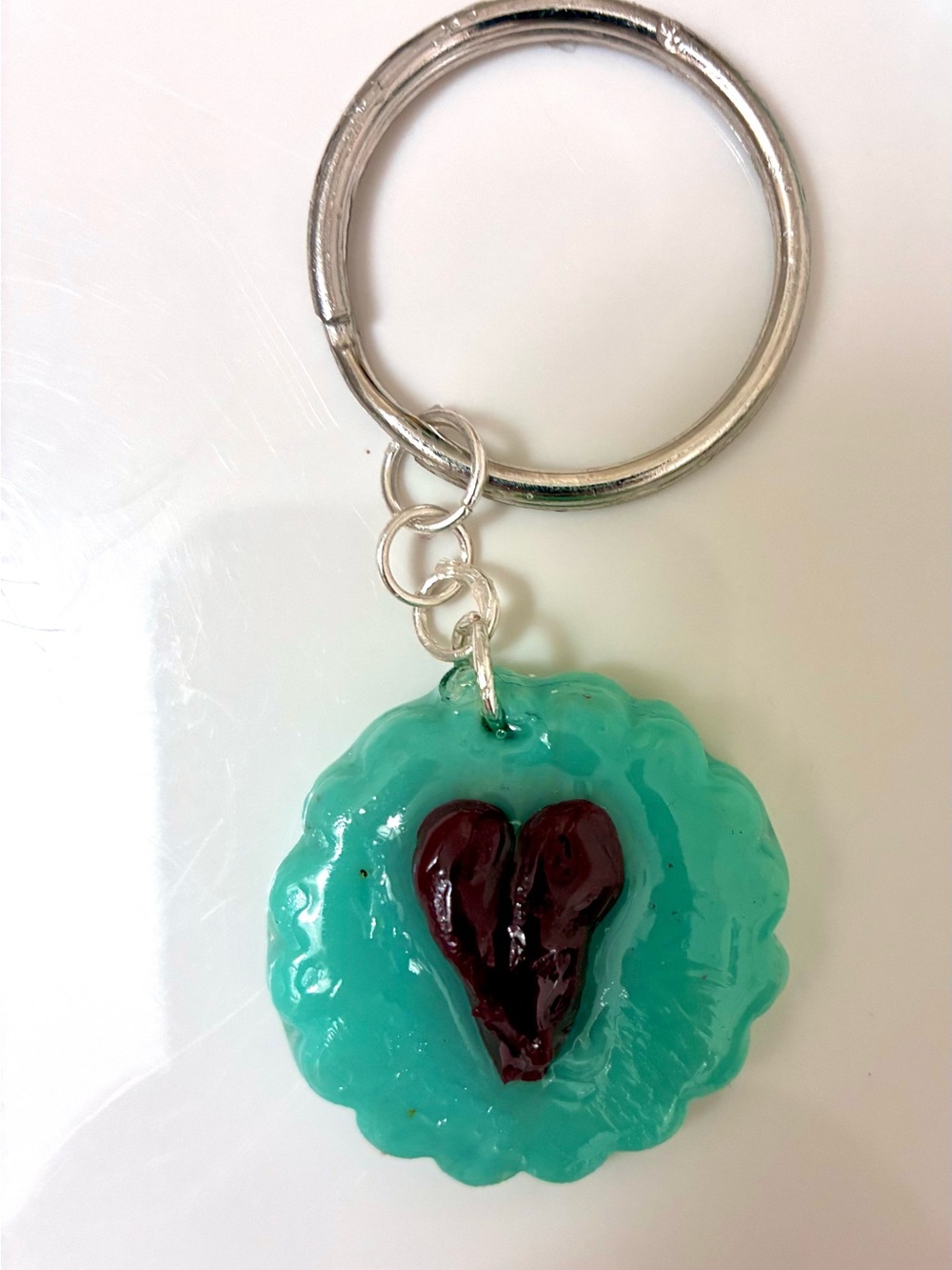 Green keychain with 3D heart